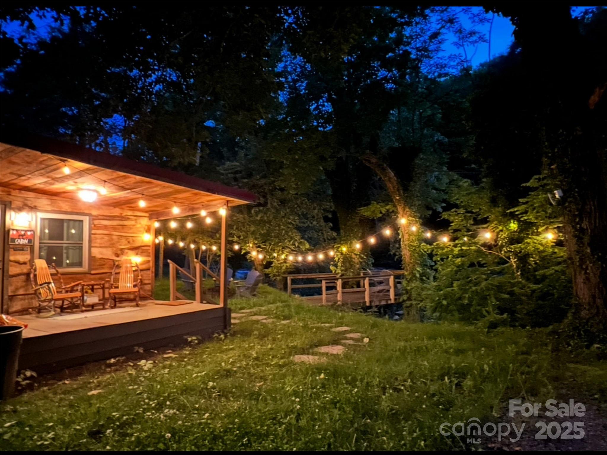 9386 Cruso Road Canton, NC 28716 - Photo 38 of 40 a view of a porch with a bench