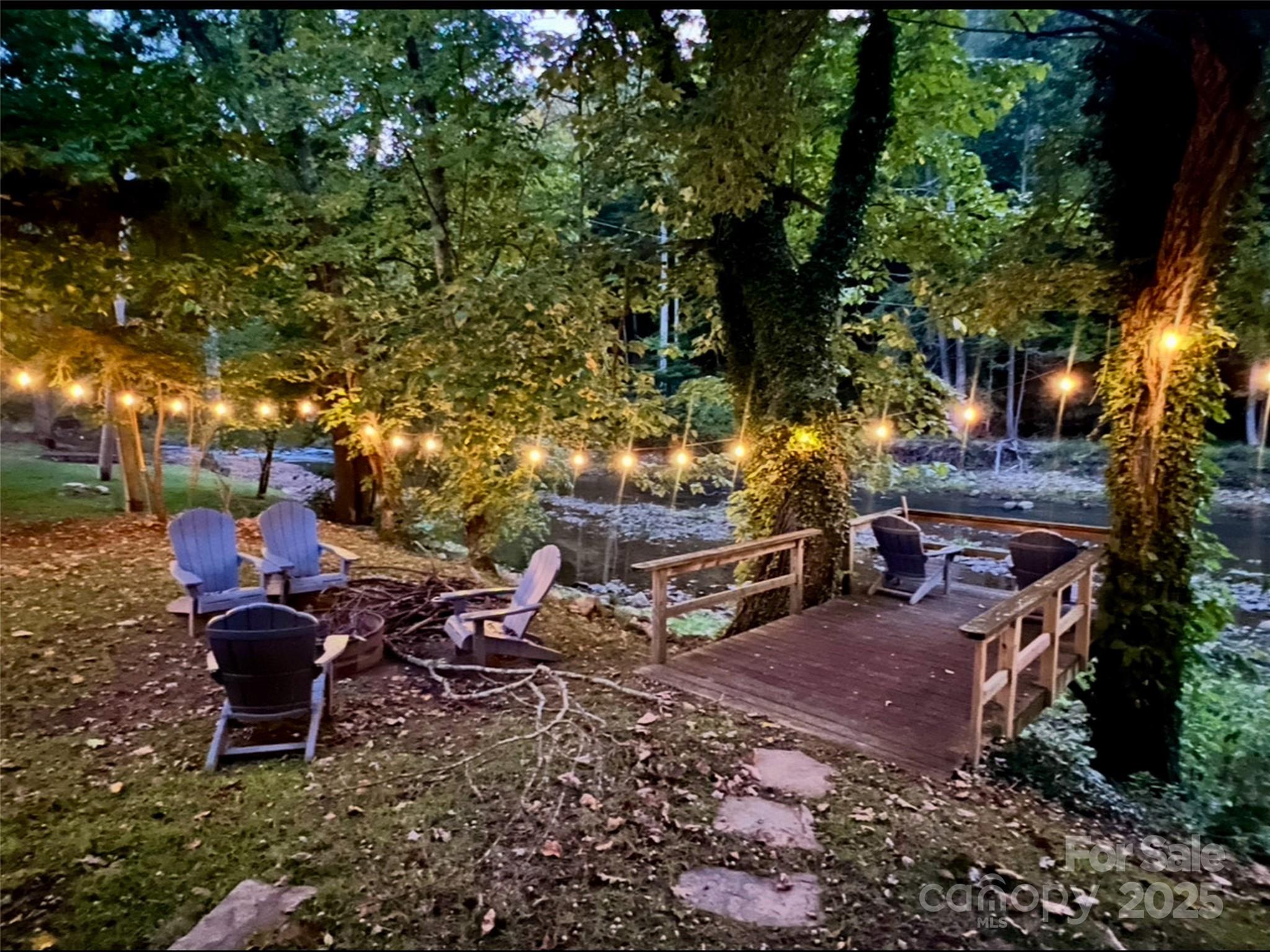 9386 Cruso Road Canton, NC 28716 - Photo 40 of 40 a view of a backyard with sitting area