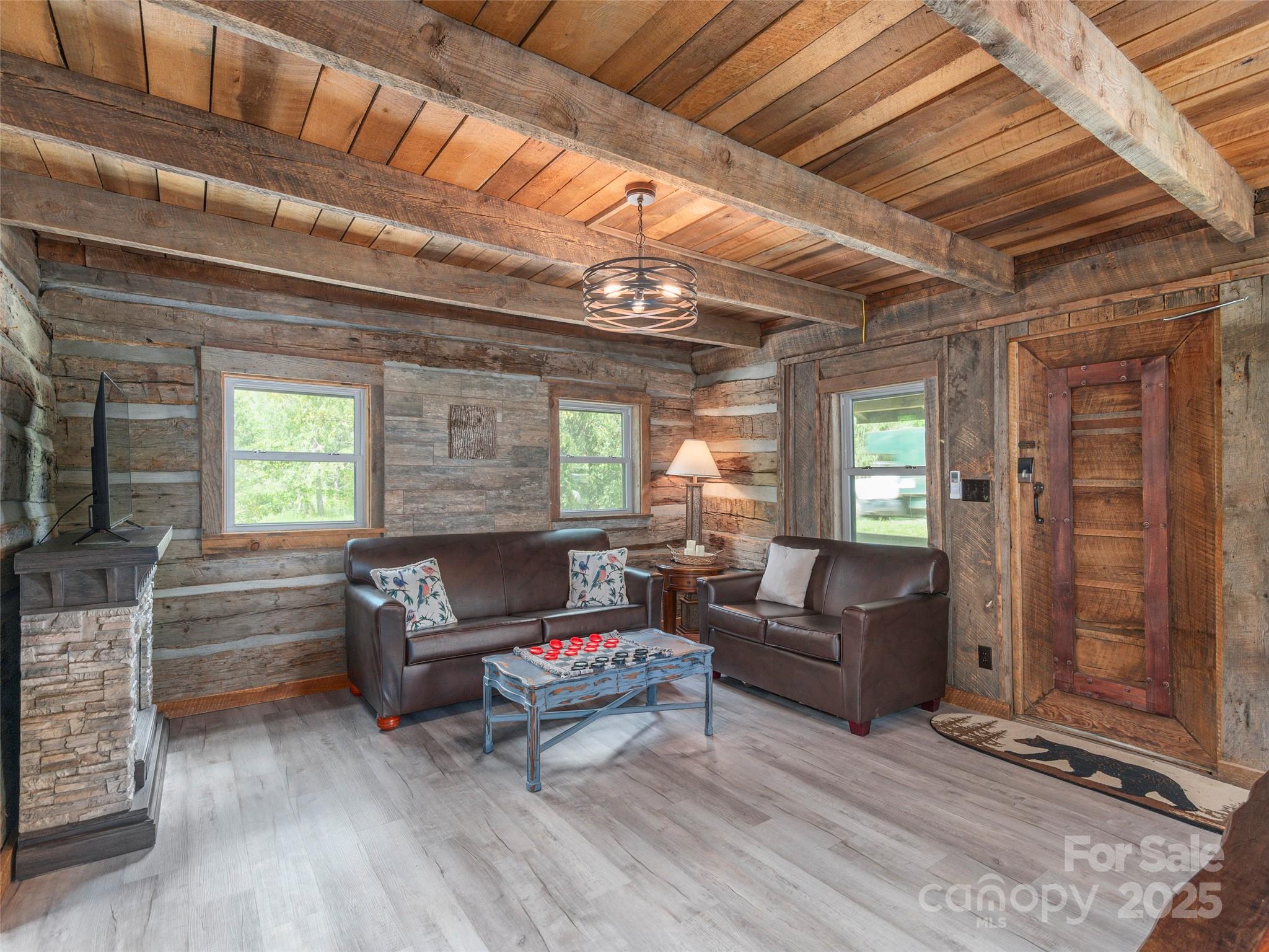 9386 Cruso Road Canton, NC 28716 - Photo 8 of 40 a living room with furniture and a window