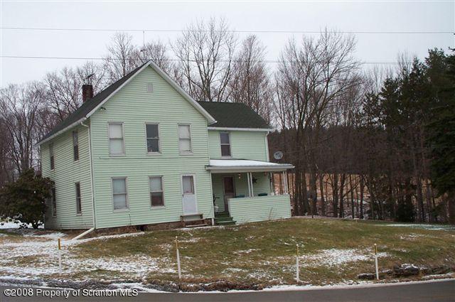 257 Bendix Road Montrose, PA 18801 - Photo 3 of 5 a view of a house with a yard