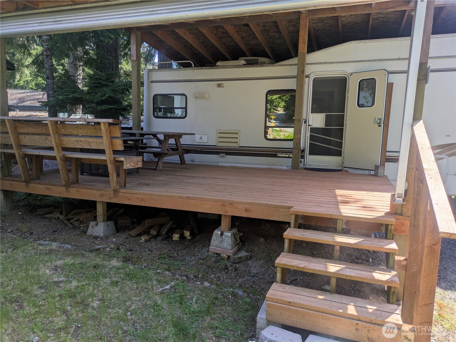 44957 Kachess Trail, Unit 2C97 Concrete, WA 98237 - Photo 4 of 16 a view of a chairs and table in patio