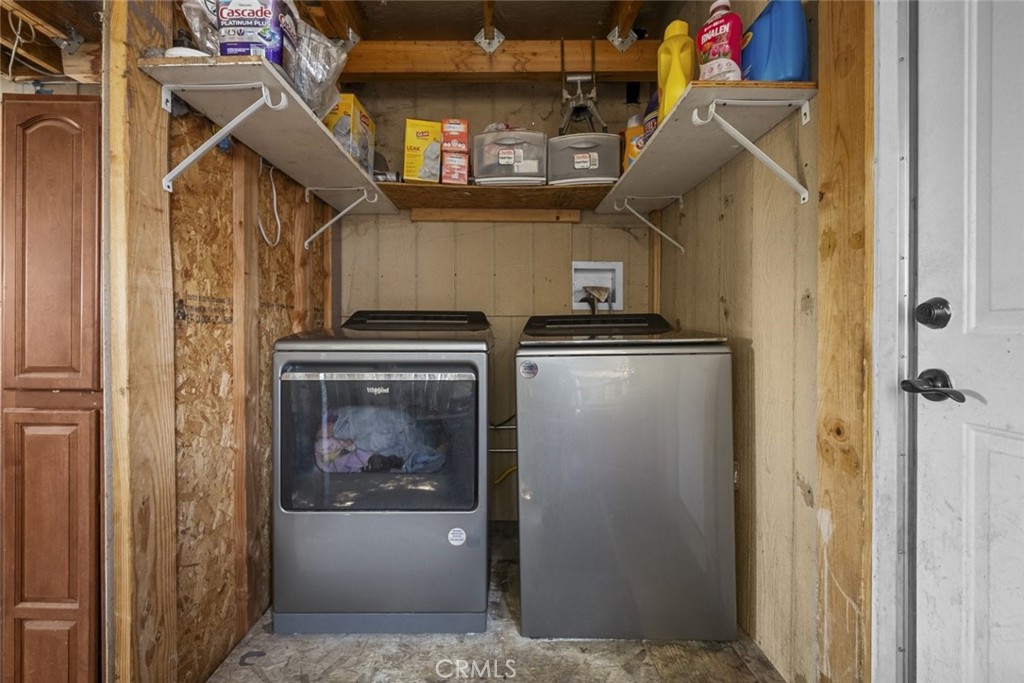 3255 East Avenue R, Unit 34 Palmdale, CA 93550 - Photo 25 of 32 a view of a storage and utility room