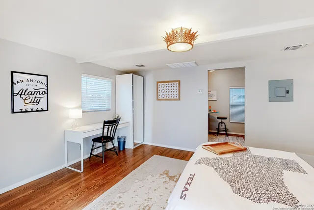 a white toilet sitting next to a bathroom sink