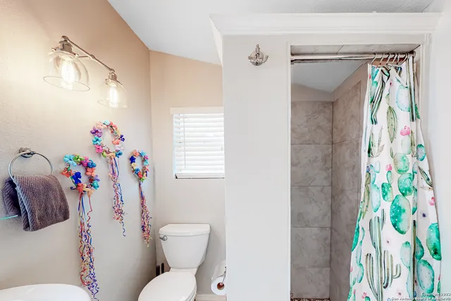 a outdoor living space with furniture and a rug