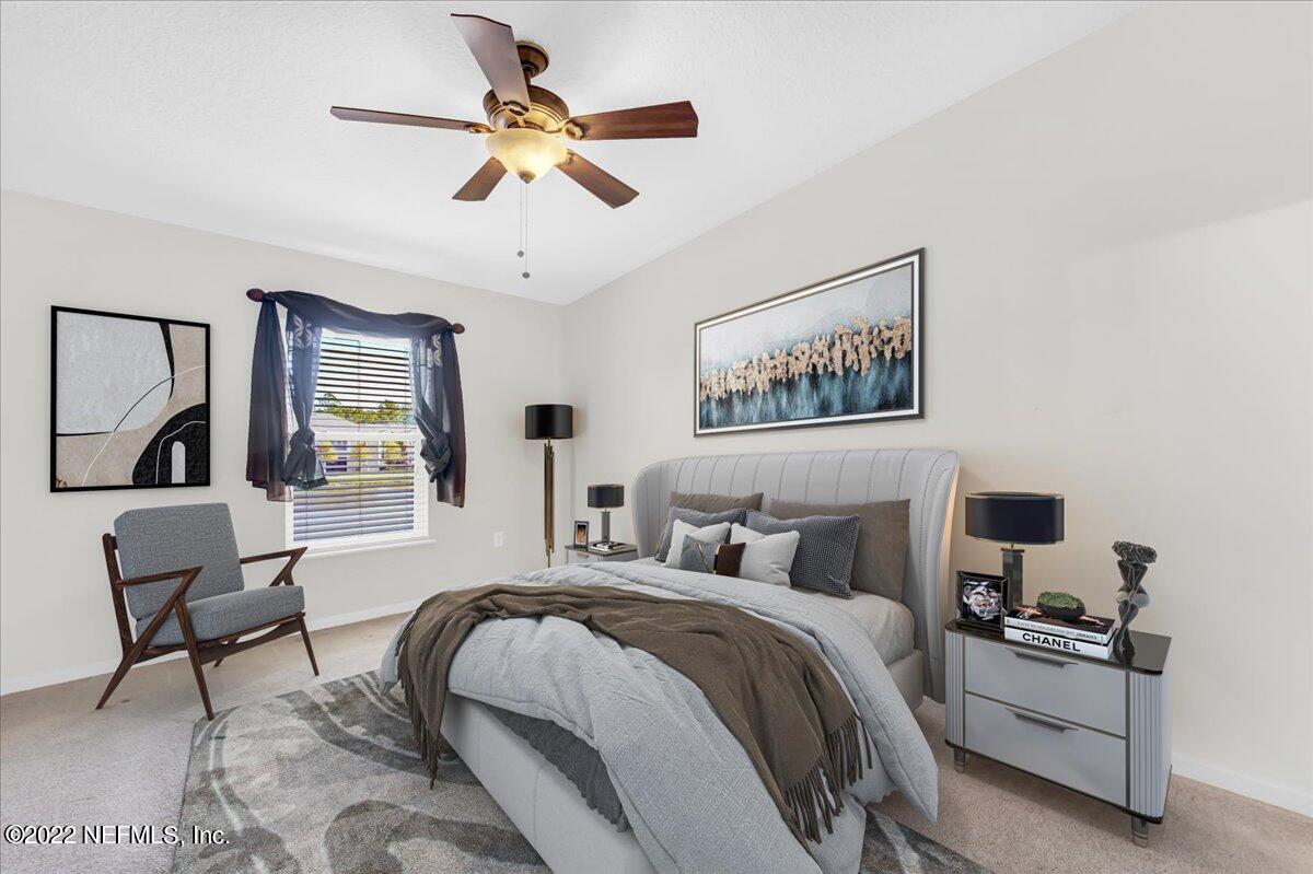 408 Golden Lake Loop, Unit 408 St. Augustine, FL 32084 - Photo 15 of 23 Master Staged Bedroom