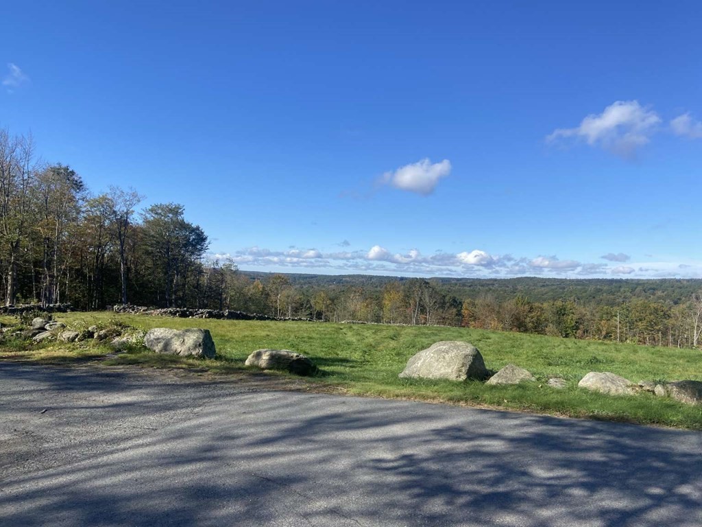 99 Gibson Road Ashburnham, MA 01430 - Photo 5 of 7 a view of a big yard with an outdoor space