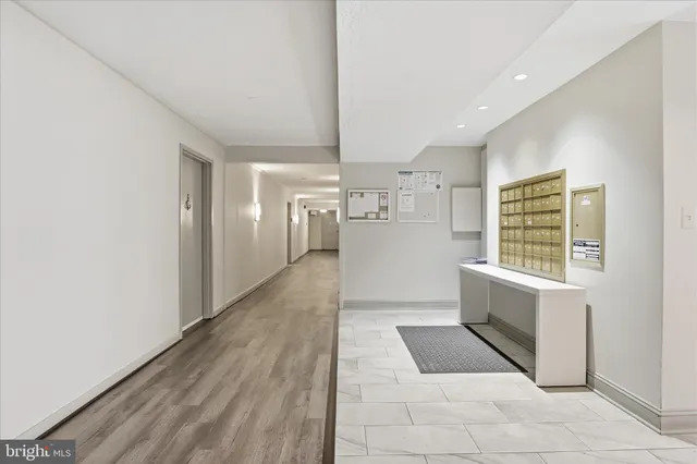 a view of entryway with kitchen