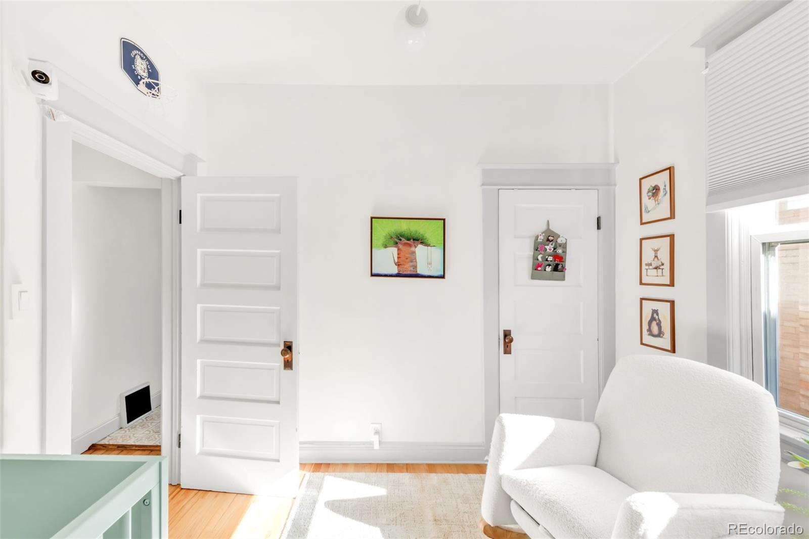 3244 Clay Street Denver, CO 80211 - Photo 18 of 28 a living room with furniture and a window