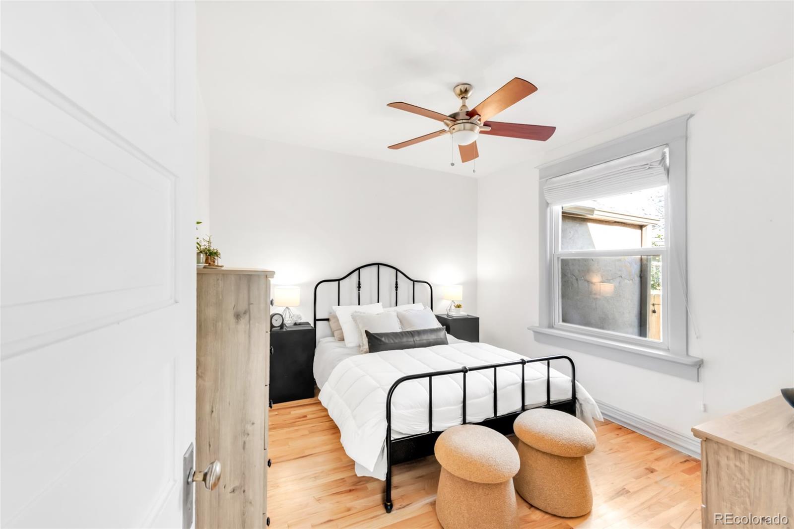 3244 Clay Street Denver, CO 80211 - Photo 20 of 28 a bedroom with a bed and window