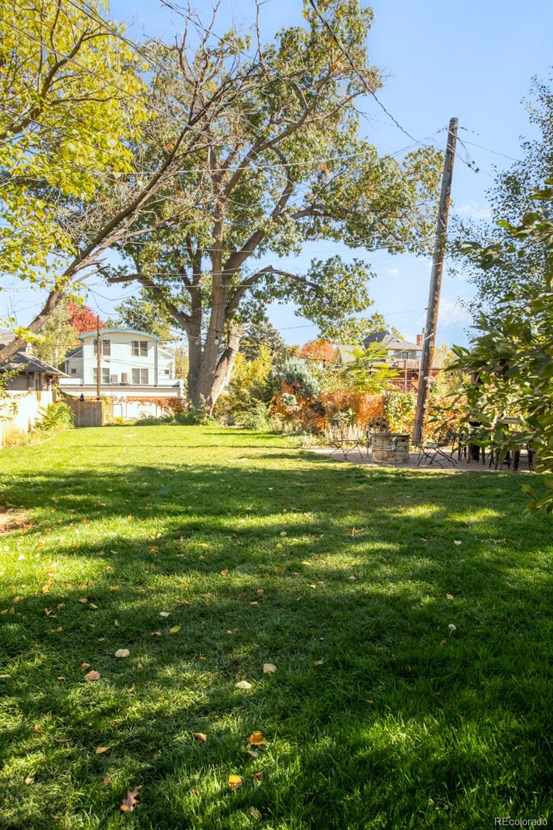 3244 Clay Street Denver, CO 80211 - Photo 28 of 28 a backyard of a building with trees
