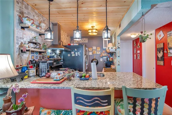 a bathroom with a sink mirror and vanity