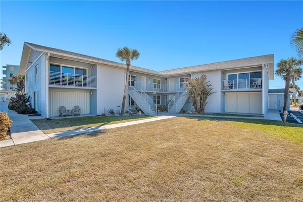 a house view with a backyard space