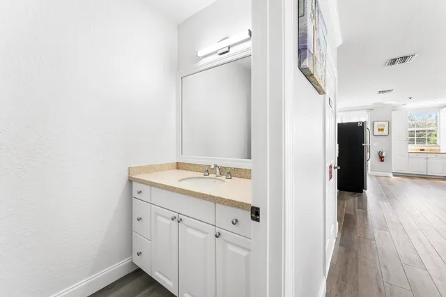 a bedroom with double bed and a window