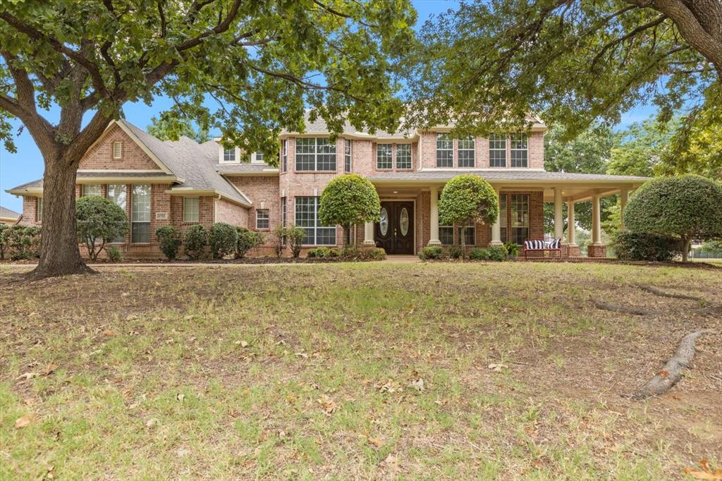 4702 Boulder Drive Parker, TX 75002 - Photo 1 of 1 a front view of a house with a yard