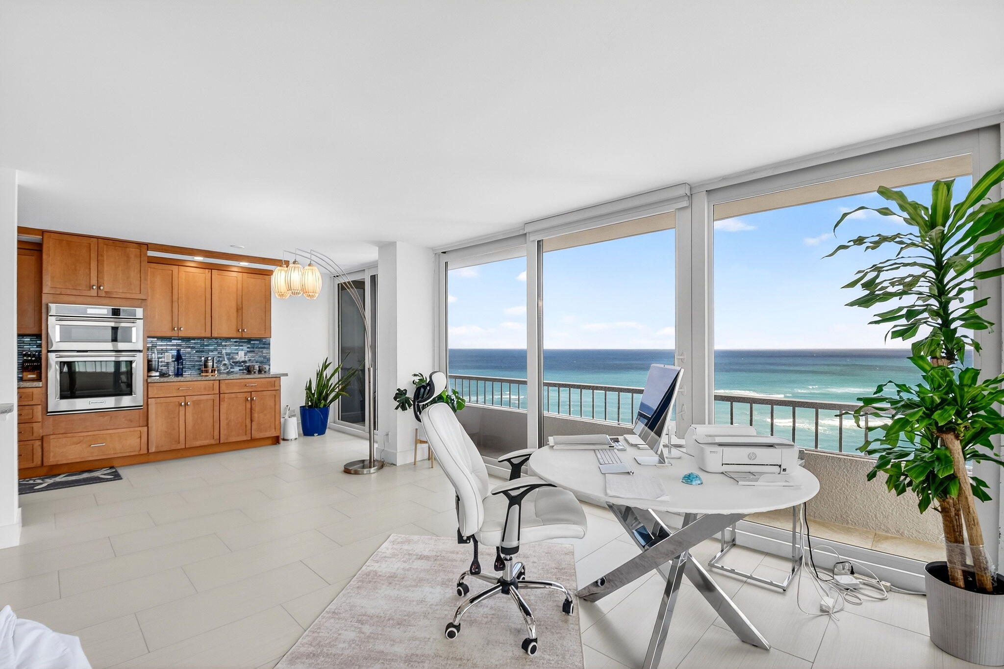 5540 North Ocean Drive, Unit 9B Singer Island, FL 33404 - Photo 23 of 57 a dining room with furniture and front door view