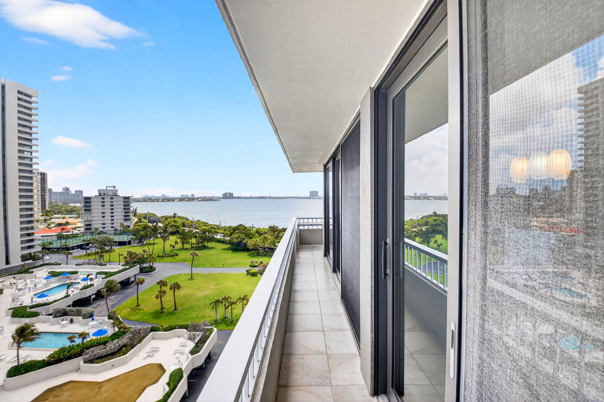 5540 North Ocean Drive, Unit 9B Singer Island, FL 33404 - Photo 27 of 57 a view of swimming pool from a balcony