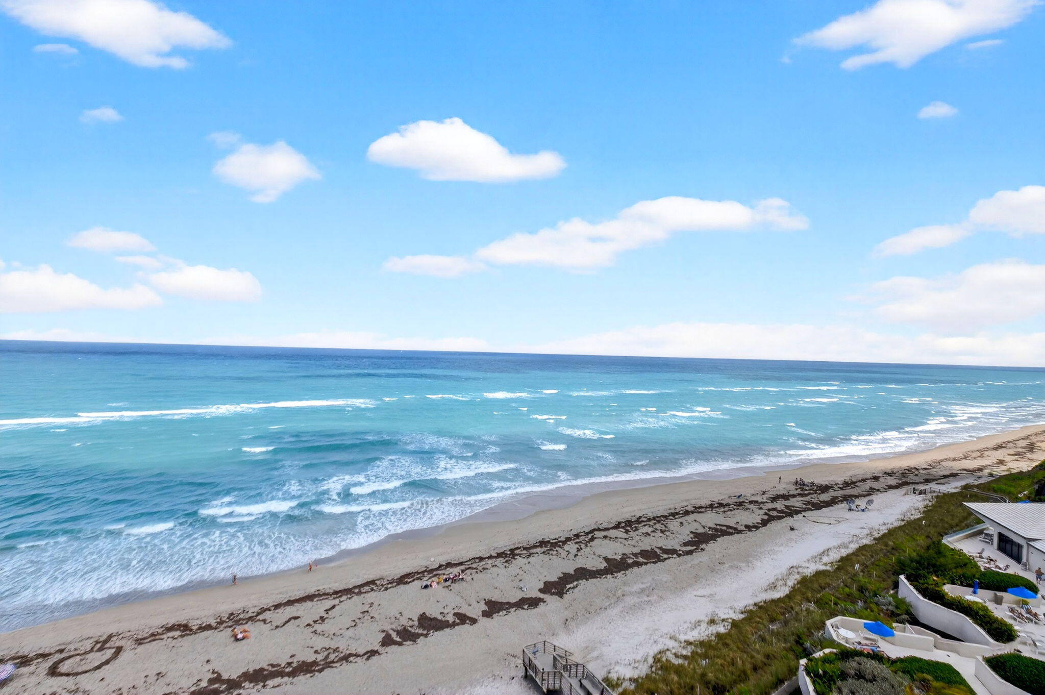 5540 North Ocean Drive, Unit 9B Singer Island, FL 33404 - Photo 29 of 57 a view of an ocean and beach