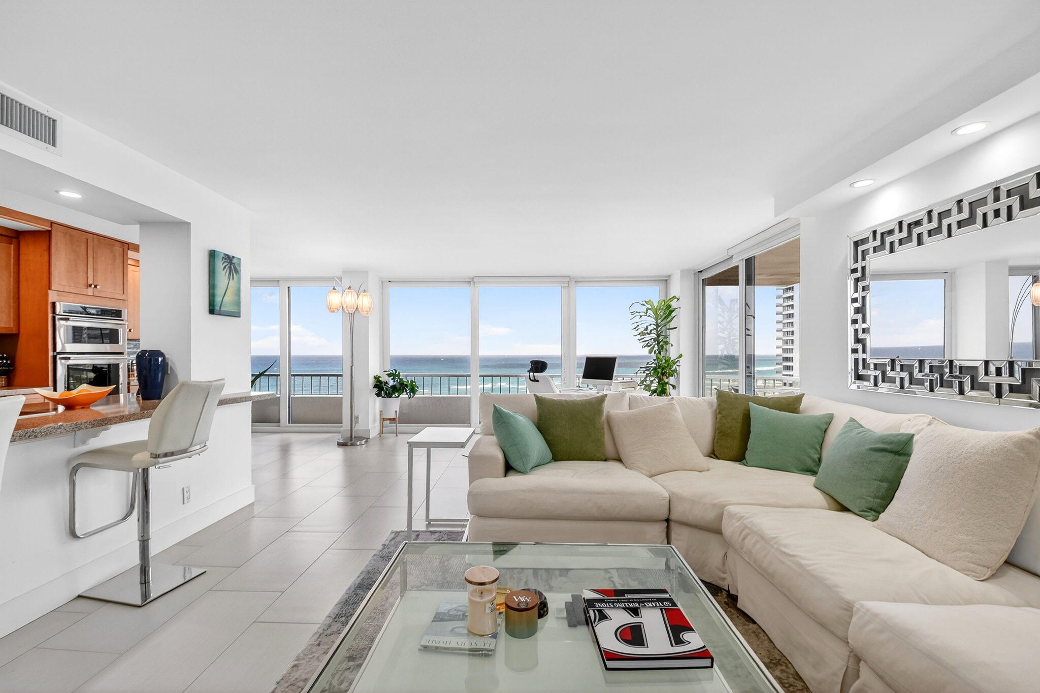5540 North Ocean Drive, Unit 9B Singer Island, FL 33404 - Photo 3 of 57 a living room with furniture and a rug
