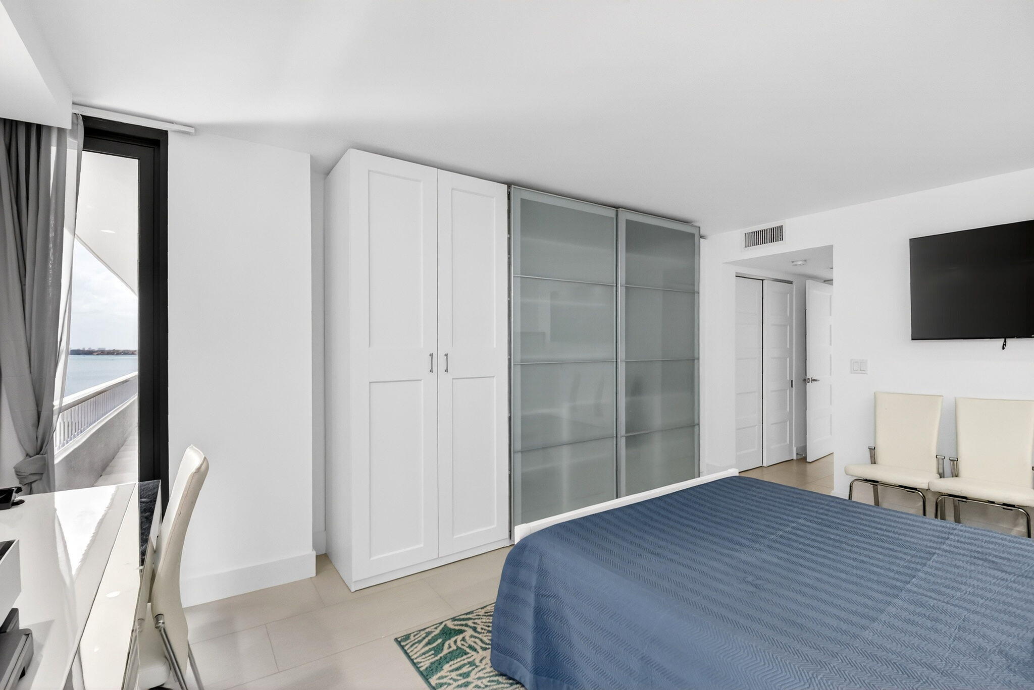 5540 North Ocean Drive, Unit 9B Singer Island, FL 33404 - Photo 36 of 57 a view of a livingroom with furniture and wooden floor