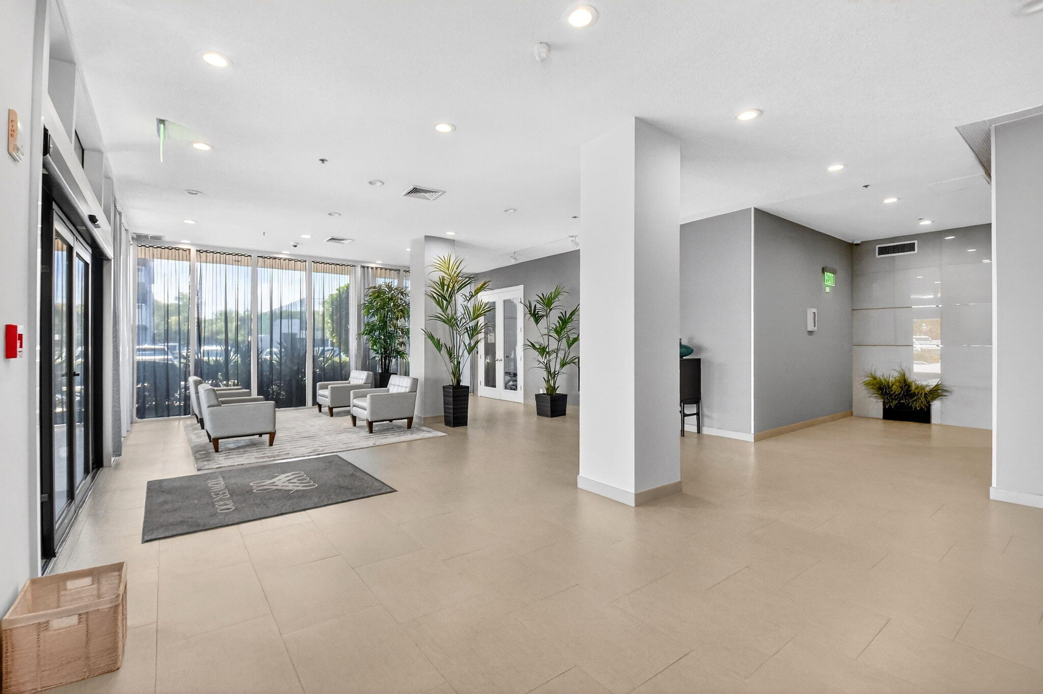 5540 North Ocean Drive, Unit 9B Singer Island, FL 33404 - Photo 55 of 57 a living room with furniture and large windows