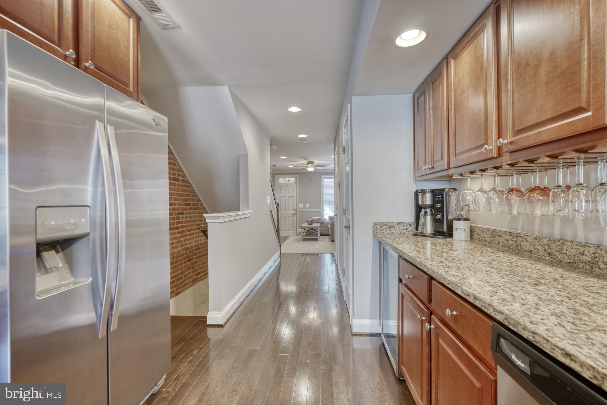 1818 Byrd Street Baltimore, MD 21230 - Photo 18 of 48 a view of a kitchen cabinets and wooden floor