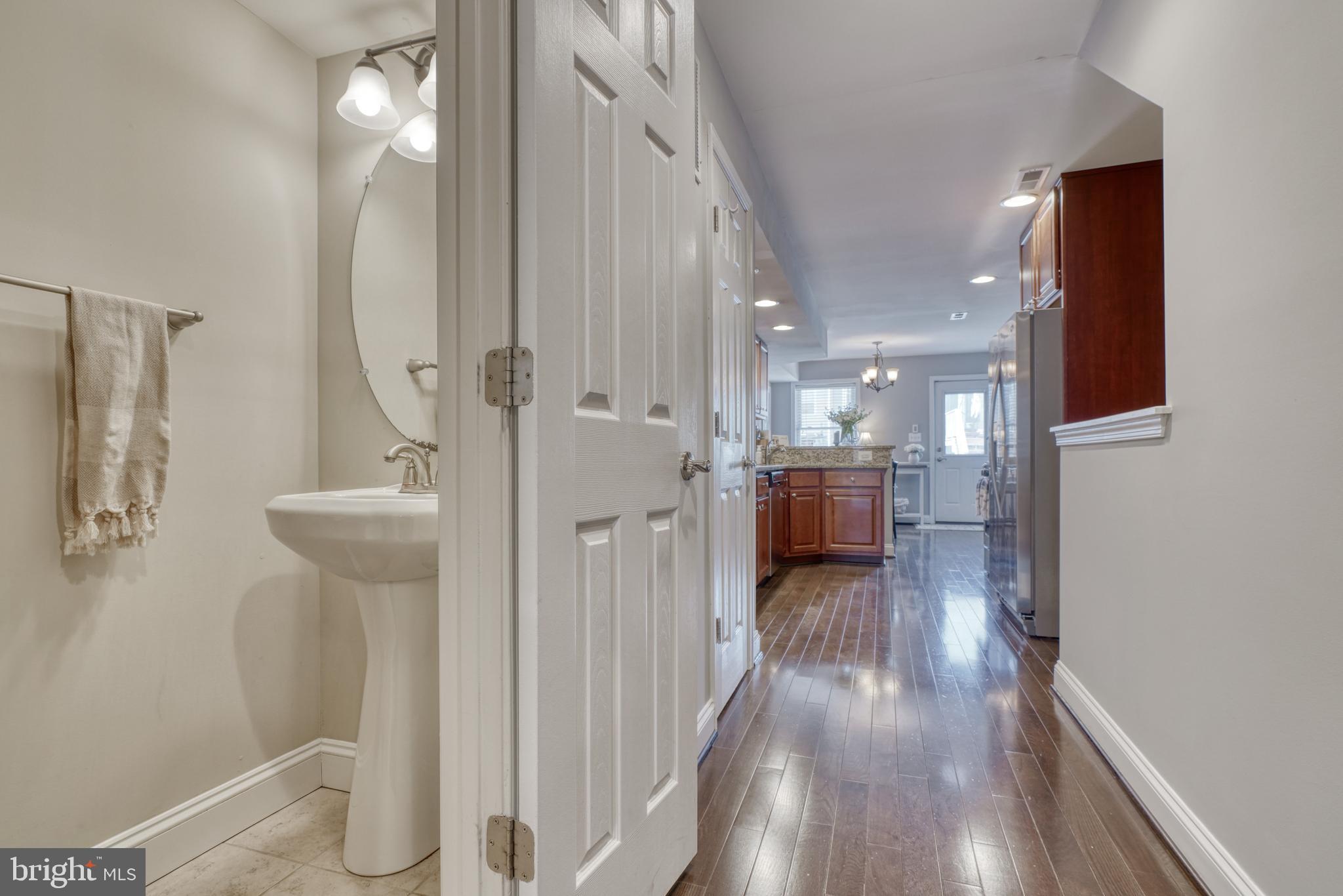 1818 Byrd Street Baltimore, MD 21230 - Photo 22 of 48 a view of a kitchen and wooden floor