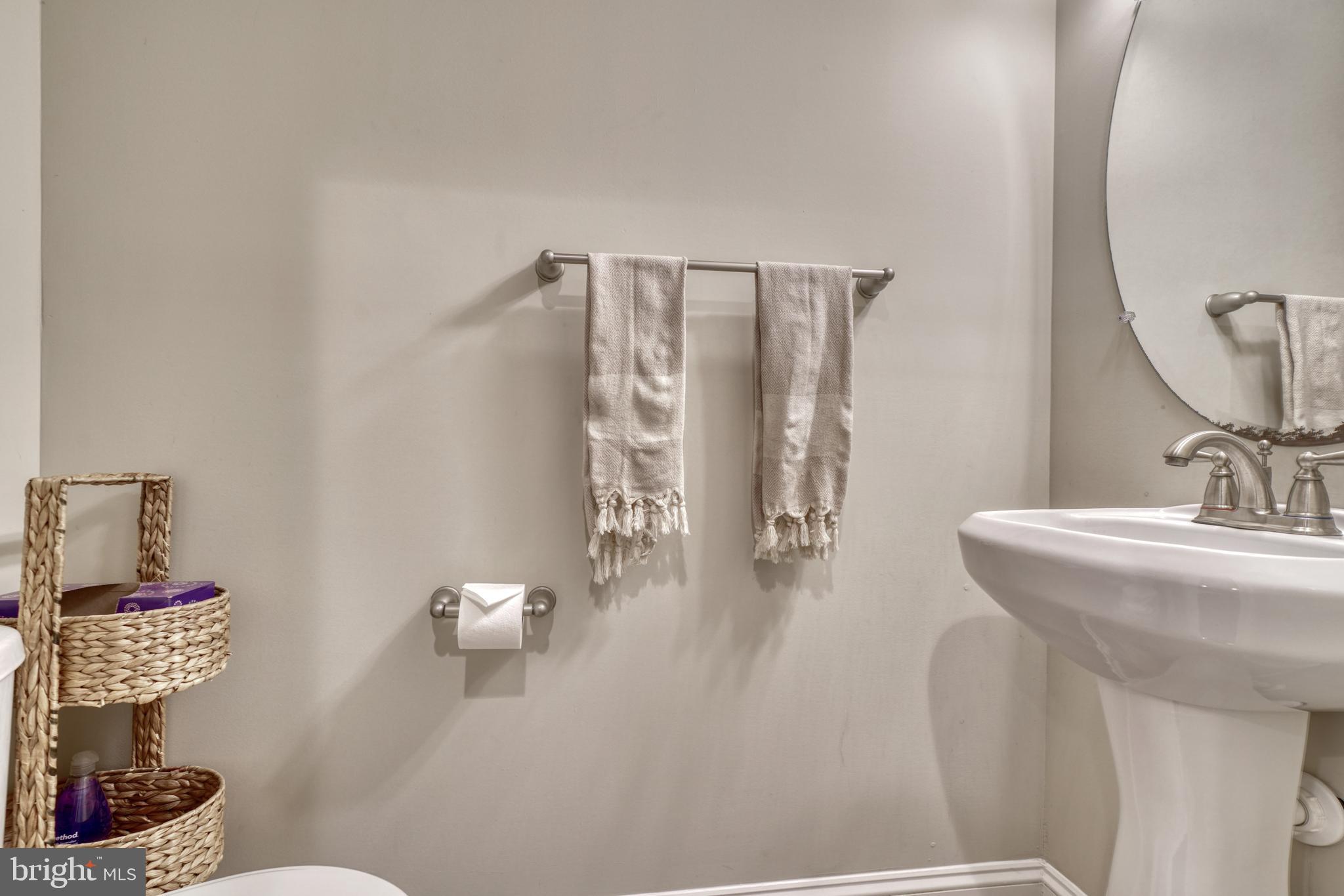 1818 Byrd Street Baltimore, MD 21230 - Photo 23 of 48 a bathroom with a sink and a mirror
