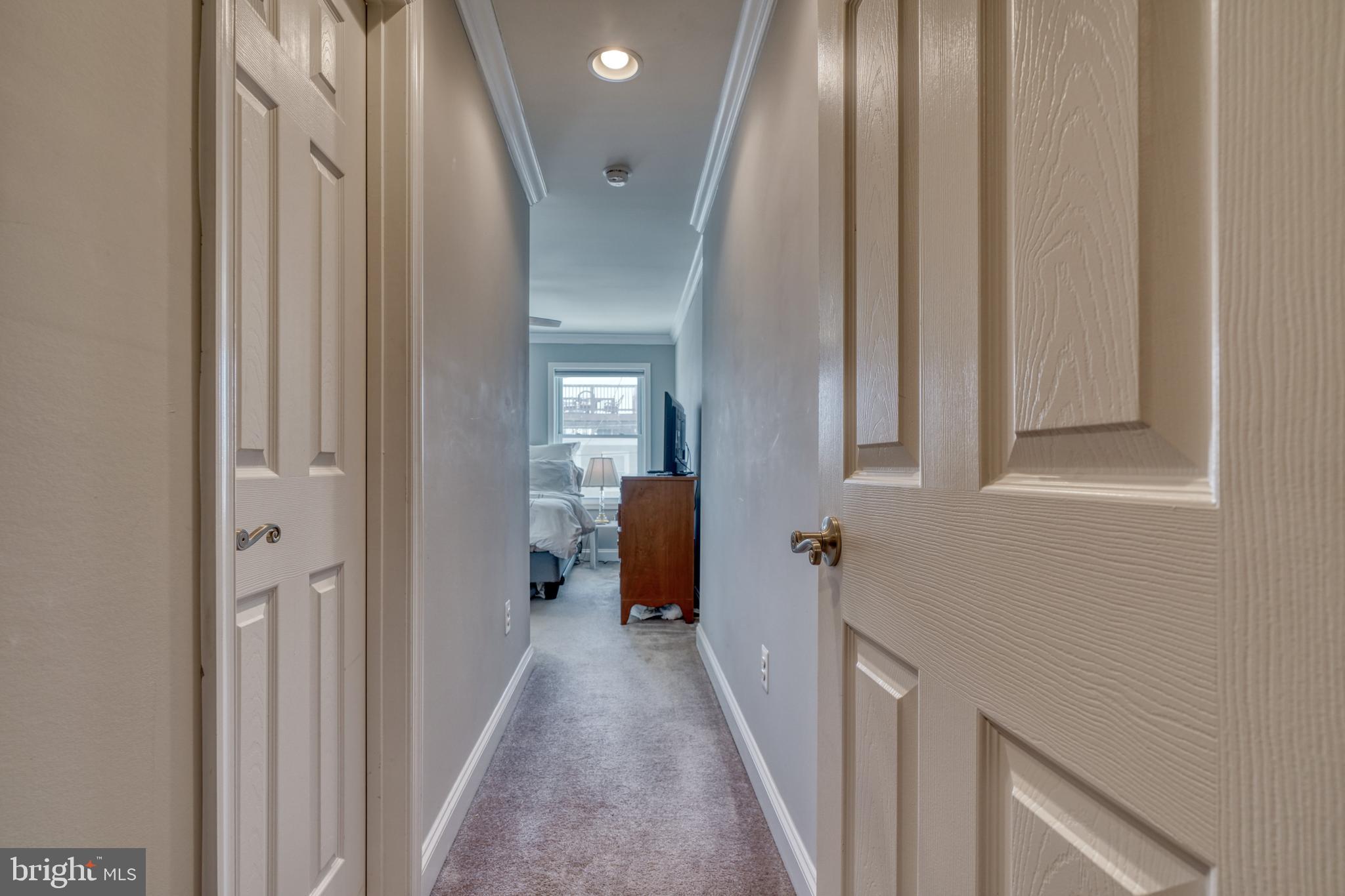 1818 Byrd Street Baltimore, MD 21230 - Photo 29 of 48 a view of a hallway with windows and stairs