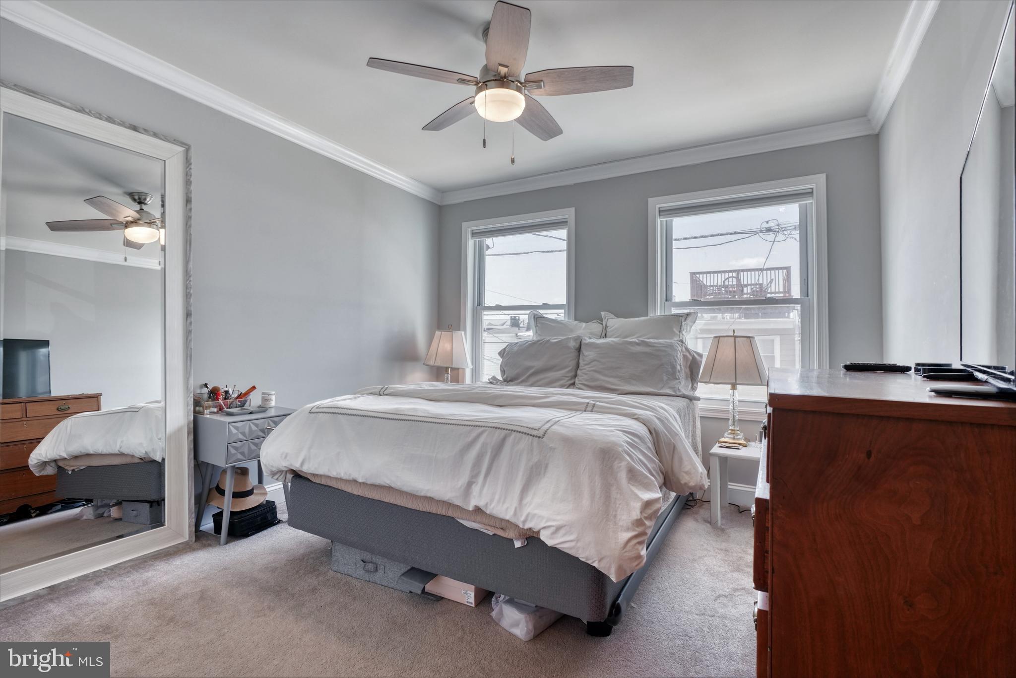 1818 Byrd Street Baltimore, MD 21230 - Photo 30 of 48 a spacious bedroom with a bed and window