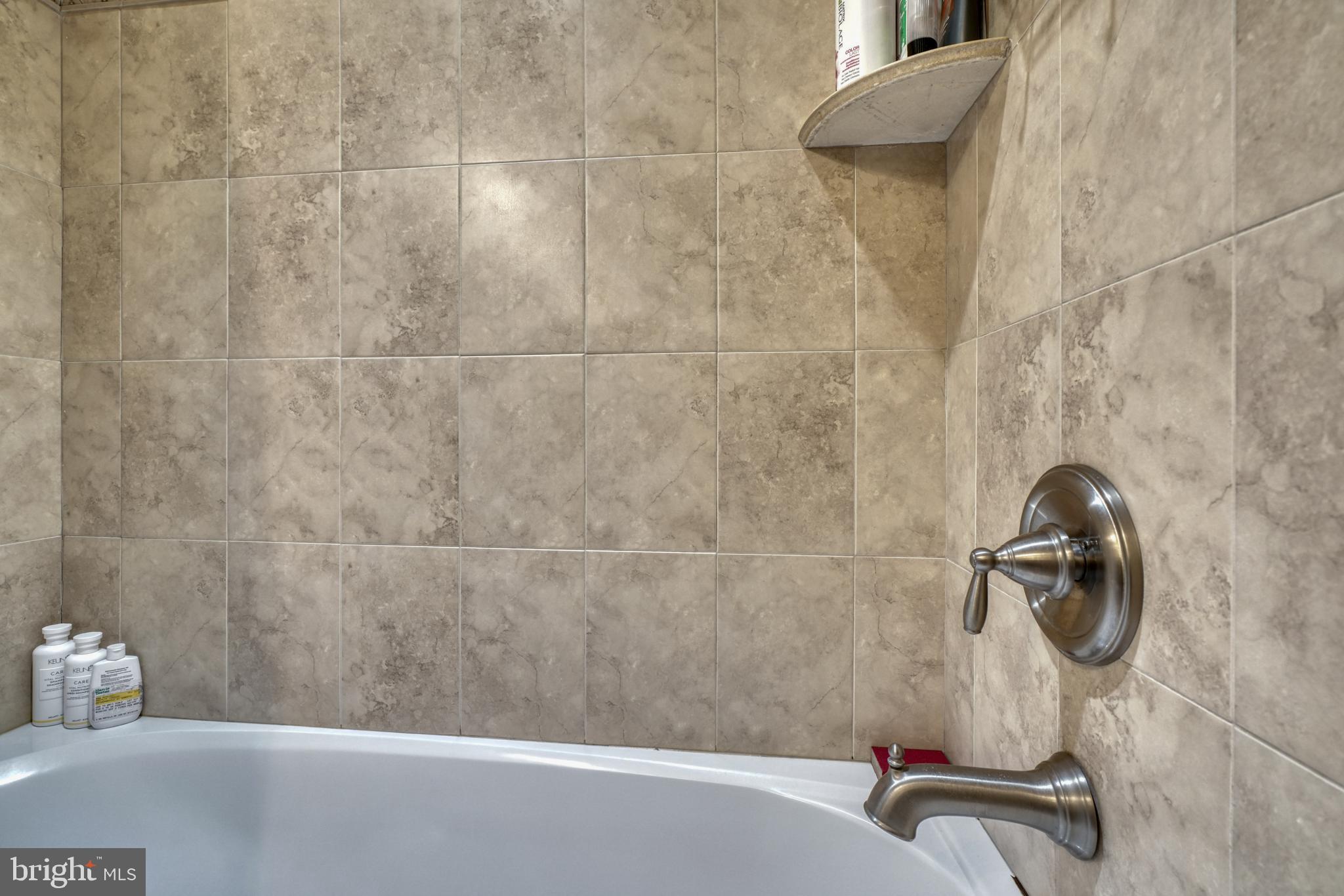 1818 Byrd Street Baltimore, MD 21230 - Photo 34 of 48 a bathroom with a bath tub