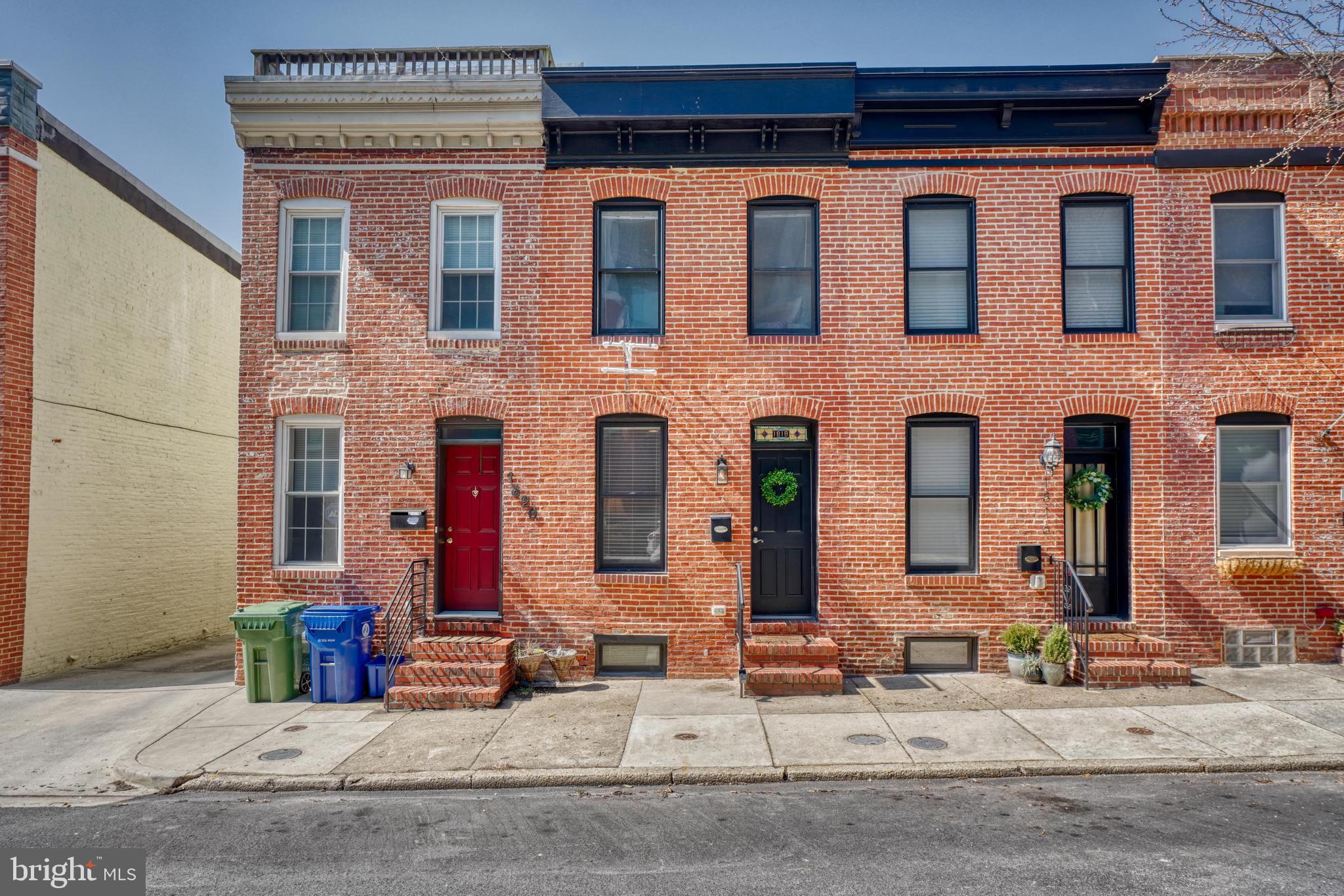 1818 Byrd Street Baltimore, MD 21230 - Photo 5 of 48 a front view of a building with street