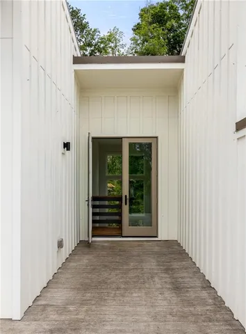 a view of room with stairs and a window