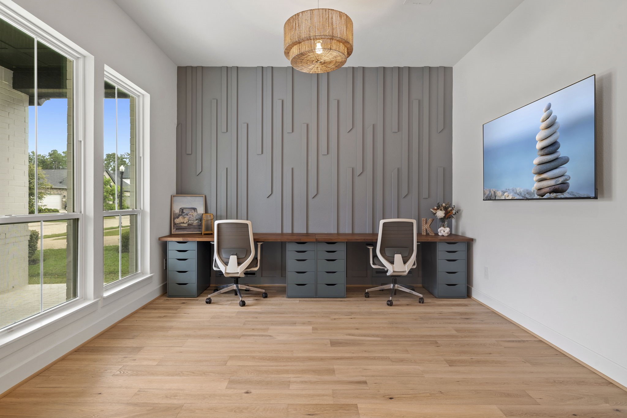 28227 Clear Breeze Court Spring, TX 77386 - Photo 8 of 35 Formal dining room currently being utilized as a second office, but perfect for multiple uses! Custom millwork and upgraded light.