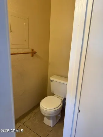a bathroom with a toilet and a sink