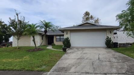 399 Barberry Lane Altamonte Springs, FL 32714 - Photo 1 of 19 a front view of a house with a yard