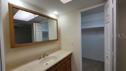 399 Barberry Lane Altamonte Springs, FL 32714 - Photo 13 of 19 a bathroom with a sink and a mirror