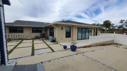 399 Barberry Lane Altamonte Springs, FL 32714 - Photo 17 of 19 a view of house and a yard with potted plants