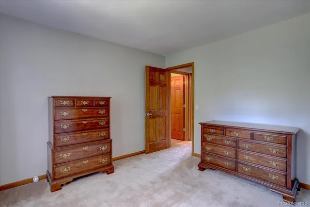 a view of room with closet and cabinet