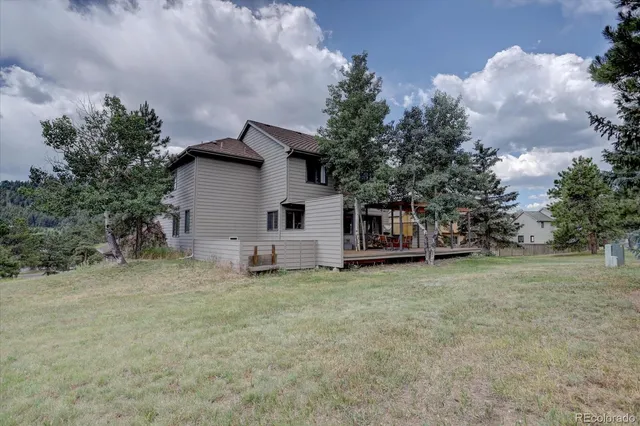 a view of a balcony with chairs