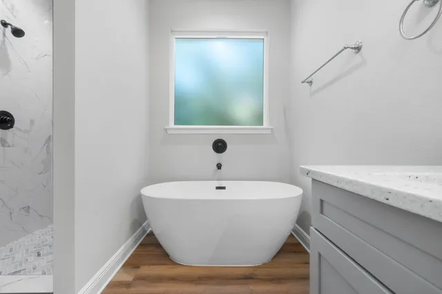 a view of a bathtub in a bathroom