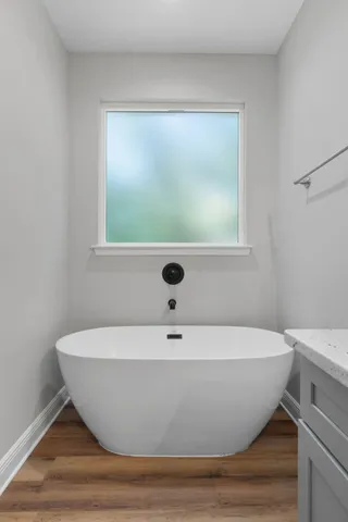 a view of a bathtub in a bathroom