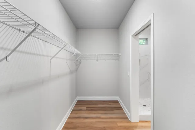 a view of a room with racks on the wall