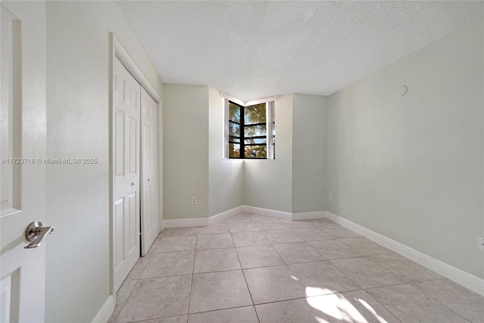 7451 Northwest 16th Street, Unit 210 Plantation, FL 33313 - Photo 16 of 40 a view of an empty room
