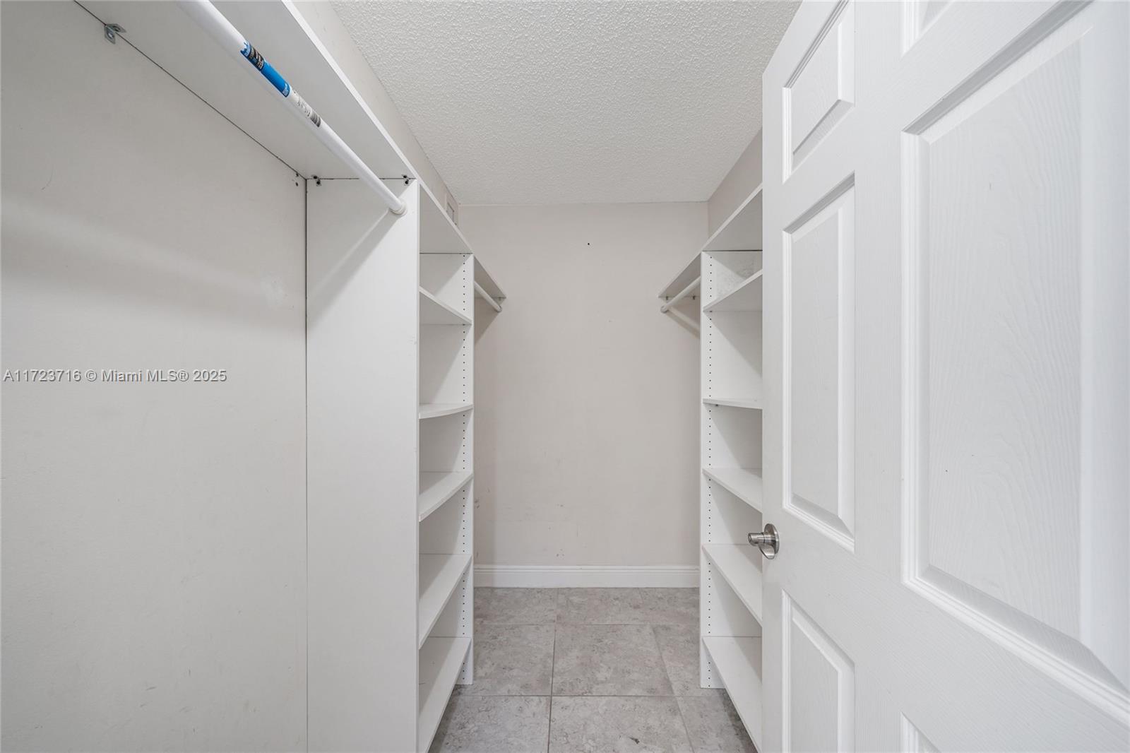 7451 Northwest 16th Street, Unit 210 Plantation, FL 33313 - Photo 17 of 40 a view of walk in closet