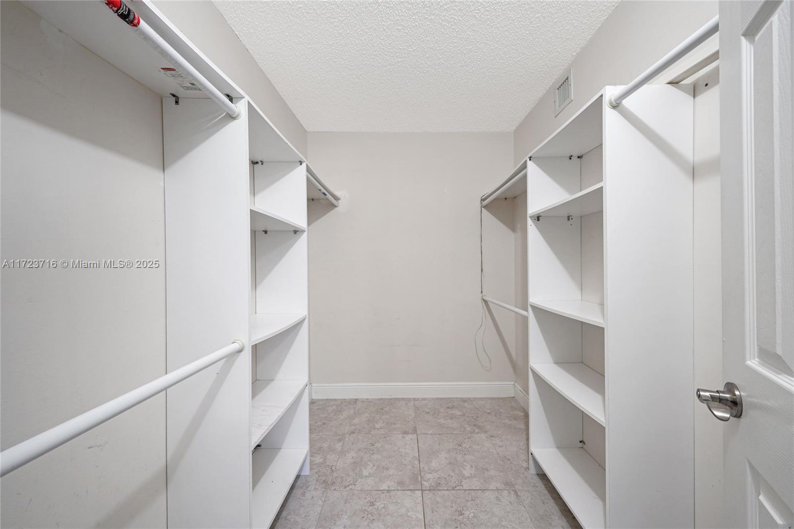 7451 Northwest 16th Street, Unit 210 Plantation, FL 33313 - Photo 28 of 40 a view of walk in closet