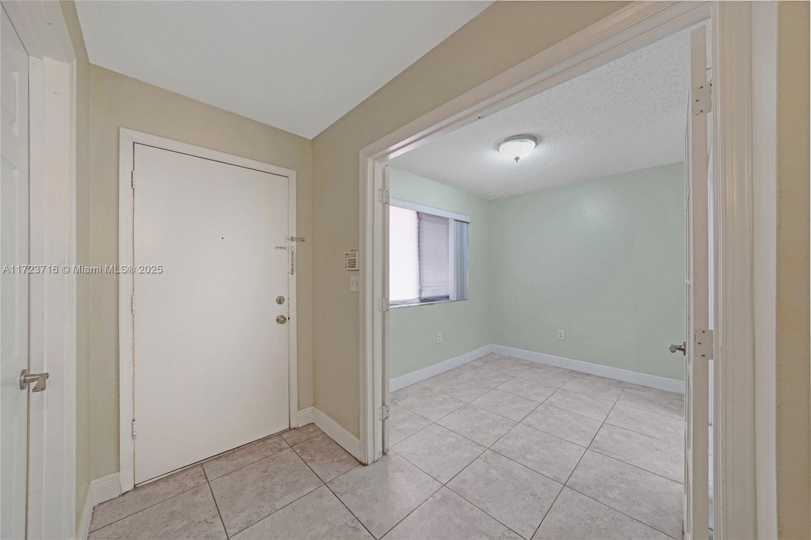 7451 Northwest 16th Street, Unit 210 Plantation, FL 33313 - Photo 3 of 40 a view of an empty room
