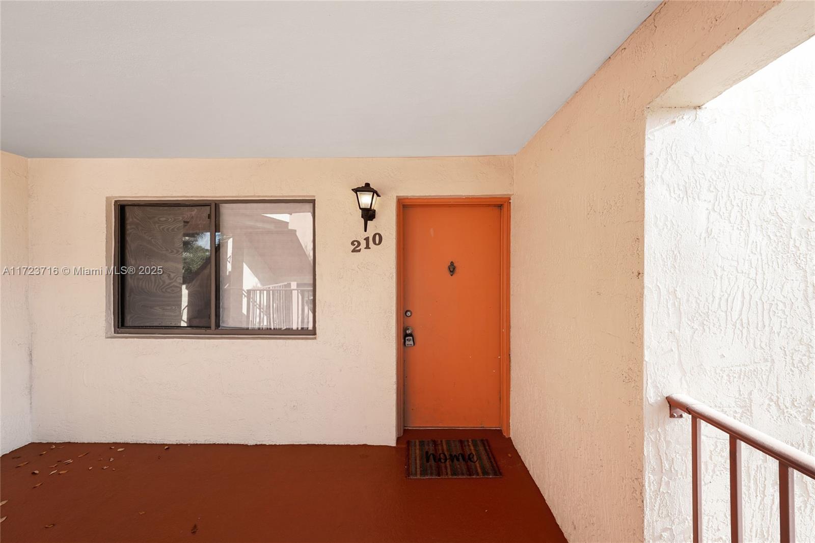 7451 Northwest 16th Street, Unit 210 Plantation, FL 33313 - Photo 32 of 40 a view of a small space with wooden floor and a window