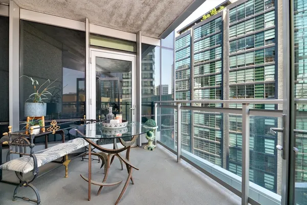 a room with lots of furniture and windows