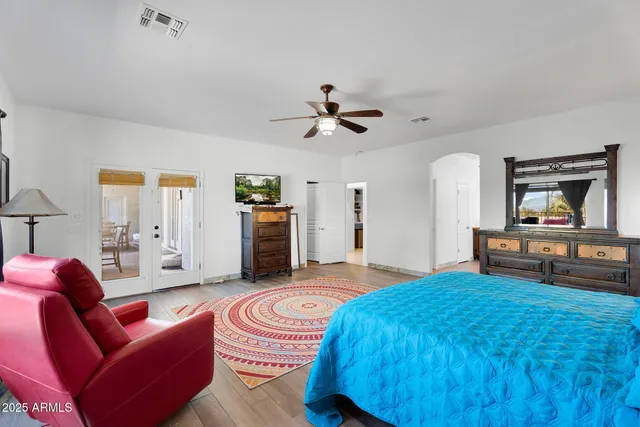 a bathroom with a toilet and shower