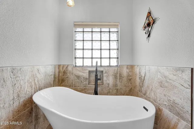 a view of a potted plant in front of a house